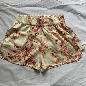 Aritzia Little Moon Cream & Orange Satin Pattern Shorts